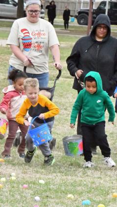 Children race to collect eggs Saturday morning at an Easter Egg Hunt in Crescent Park, which was sponsored by Food King and Ace Hardware. (Staff Photo by Derek Lopez)