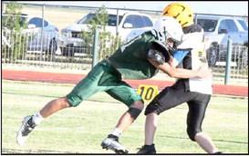 WOLVERINES LOOK SHARP IN FIRST SCRIMMAGE
