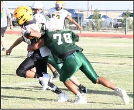 WOLVERINES LOOK SHARP IN FIRST SCRIMMAGE