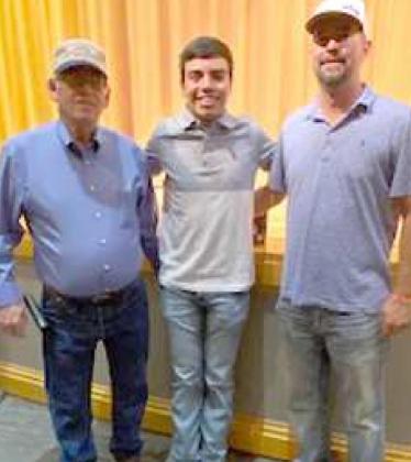 The first place award from the Lamb County SWCD essay contest went to Edward Delgado of Sudan ISD. (Shown) is Roy Thompson and Jeff Edwards to present the award to Delgado. (Submitted Photo)
