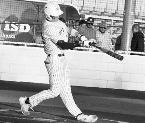 Littlefield’s Dawson Adkins ropes a two-RBI double in the left-center field gap, to put the Wildcats in front, 2-0, in the bottom of the fourth inning, as the Wildcats took down Dimmitt for a win on Senior Night. (Staff Photo by Derek Lopez)