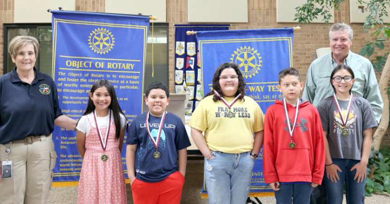 The Rotary Writers of Littlefield Elementary received their medals presented by Kay King and John Roley at the Readers, Writers, Reasoners awards ceremony held at the atrium of Lamb Healthcare Center on Thursday, April 25.2024. They are Mikenna Cristan, Noah Aguilar, Aubreyella Payan, Brayden Aleman, and Peyton Lundberg. (Photo by Ann Reagan)