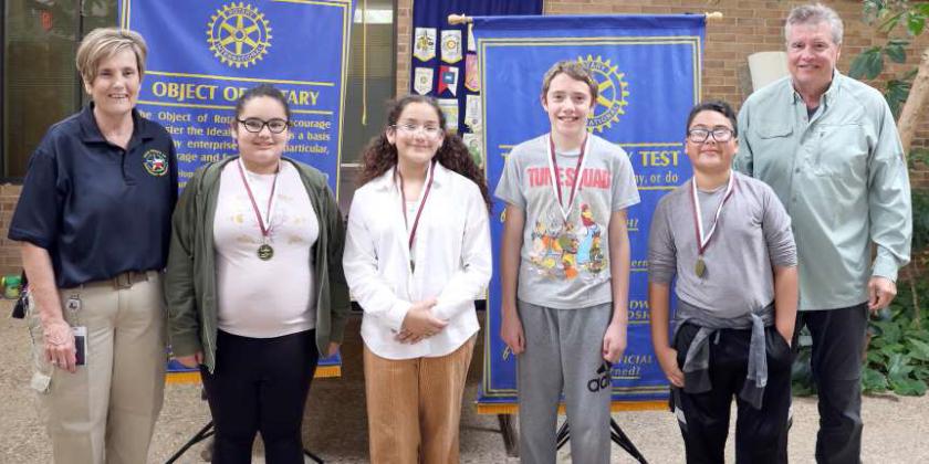 The Rotary Reasoners of Littlefield Elementary received their medals presented by Kay King and John Roley at the atrium of Lamb Healthcare Center on Thursday, April 25, 2024. They are Liliana Banda, Leah Camacho, Charlie Johnson, and Javier Pompa Gallegos. (Photo by Ann Reagan)
