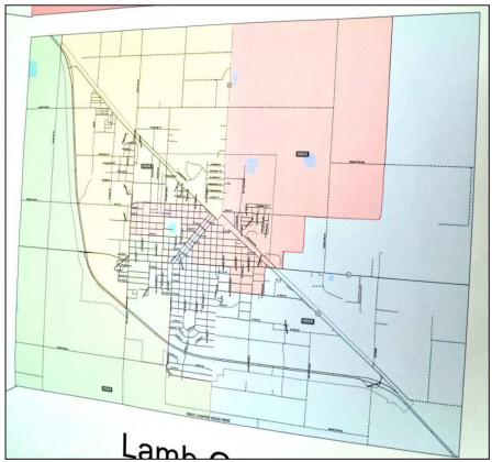 COUNTY COMMISSIONERS’ PRECINCT CHANGES – The different colors on this new map of Littlefield, indicate the Commissioner Precincts as they are changed, and now being observed in the City of Littlefield. The redistricting was all done in Littlefield. The Pink area is Precinct 1; the Yellow area is Precinct 2; the Blue area is Precinct 3; and the Green area is Precinct 4. There is no longer a Voting District 7, which has completely been removed. (Staff Photo by Joella Lovvorn)