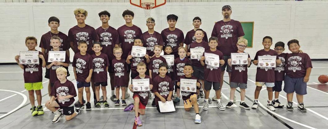 The morning session of the 2026 Littlefield Wildcat basketball camp wrapped up on Thursday. Shown are the campers, along with Coach Nathan McKinnon and Jason Ayala, as well as the varsity players who helped out with the camp this week. (Staff Photo by Derek Lopez)