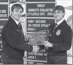 Tate Clark presents Ty Carr with the Chapter Leadership Development Events Star award at the Littlefield FFA banquet on May 18, 2026.