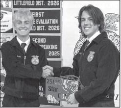 Payton Bussanmas presents Boston Halton with the Chapter Career Development Events Star award at the Littlefield FFA banquet on May 18, 2026.