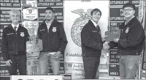 Payton Bussanmas and Tate Clark present Eric Trejo and Uriel Ibarra with the Top Hand award at the Littlefield FFA banquet on May 18, 2026.