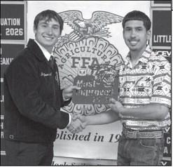 Tate Clark presents the Most Approved Award to Manny Garcia at the Littlefield FFA banquet on May 18, 2026.