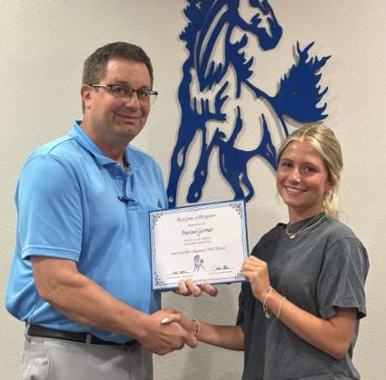 Tullie Struve, School Board President, left, awards Harlow Gorman, right, Olton Fillie Tennis Regional Qualifier. (Submitted Photo)