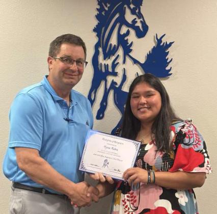 Tullie Struve, School Board President, left, awards Alyssa Rivera, right, Olton Fillies Softball - Honorable Mention Infielder. (Submitted Photo)