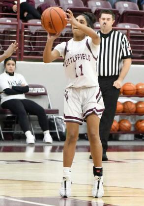 Littlefield’s Aubree Richardson puts up a jumper, during the second half of the Lady Cat’s season-opener on Saturday against the Estacado Lady Matadors. (Staff Photo by Derek Lopez)