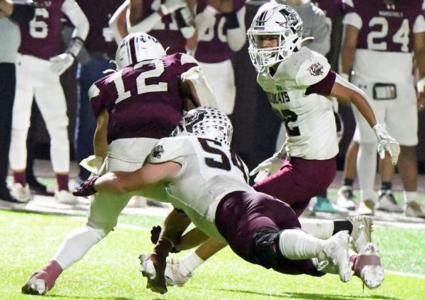 Littlefield senior defensive tackle, Jakob Kirkland, runs down the Roosevelt quarterback for a sack, during the fourth quarter of the Wildcats’ play-off clinching victory over the Eagles on Friday. (Staff Photo by Derek Lopez)