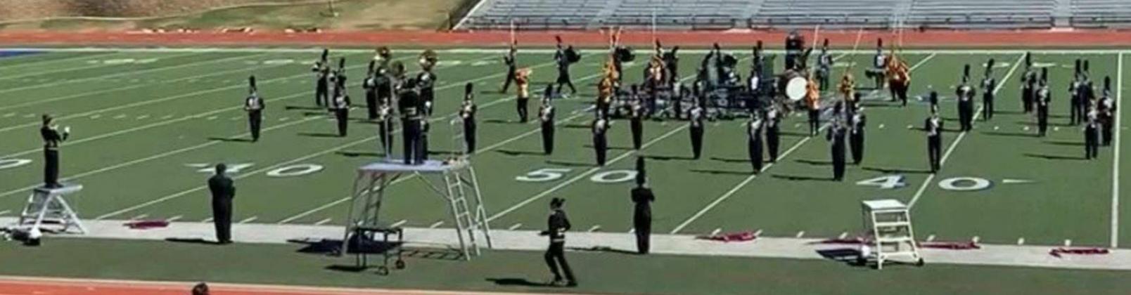 BOLD GOLD BAND ADVANCES TO AREA!