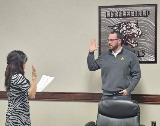 Reese Rogers takes the School Board oath, after being appointed by the Littlefield ISD School Board to fill the vacant seat for District 3 during last Thursday’s School Board Meeting. He will hold the seat until the School Board Election on May 4, 2024. (Staff Photo by Derek Lopez)