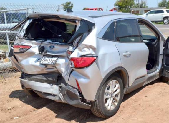 FOUR-DOOR FORD CAR REAR ENDED