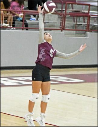LOOKING FOR AN ACE - Littlefield’s, Cali Saldana, sends over a serve, during the first set of their match against Lamesa on Tuesday, as part of a dual. They defeated Lamesa 2-0. (Staff Photo by Derek Lopez)