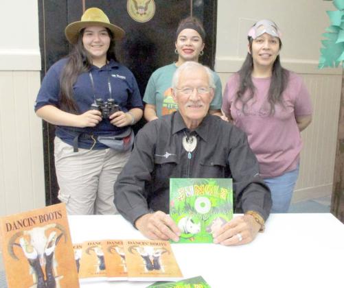 (L-R): Library volunteer Mallory Marquez, assistant librarian Ambrosia Nelson, Head Librarian Selena Ramirez with Author, William Thompson at his Book Signing for ‘Jungle O’s’ at the Lamb County Library on Nov. 21st. (Submitted Photo)