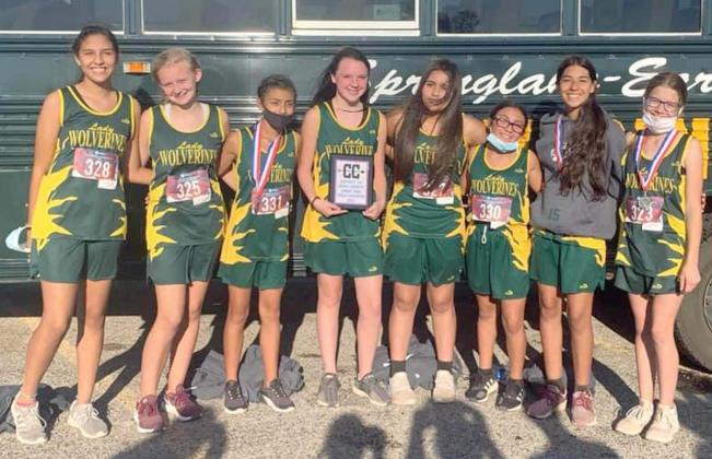 DISTRICT CHAMPIONS – The Springlake-Earth Lady Wolverines’ junior high cross country team placed first overall at the District 4-A Cross Country Meet earlier this week to claim the District 4-A title. (Shown): Aabriella Villanueva, Reagan Ethridge, Rylie Furr, Aryca Ibarra, Jessica Mendoza, Jaritza Sotelo, Hannah Alverez and Braileigh Goe. (Submitted Photo)