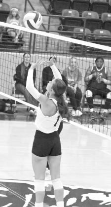 Littlefield’s Bryndle Ray sets a ball up in the air, as the Lady Cats look to go on the offensive, during their match with Tulia on Tuesday at Wildcat Gym. (Staff Photo by Derek Lopez)