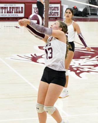 Littlefield’s Maggie McNeese saves a ball on the sideline, during the first set of the Lady Cats’ district match-up with Shallowater on Tuesday at Wildcat Gym. (Staff Photo by Derek Lopez)