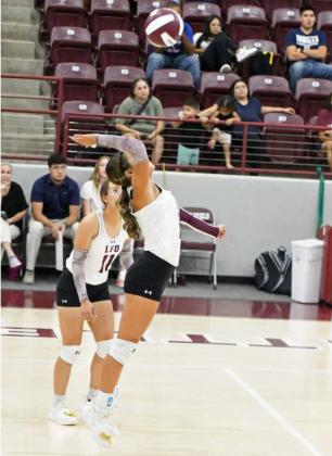 Littlefield’s Cali Saldana goes up to deliver a kill, during the first set of the Lady Cats’ district match-up with Shallowater on Tuesday at Wildcat Gym. (Staff Photo by Derek Lopez)