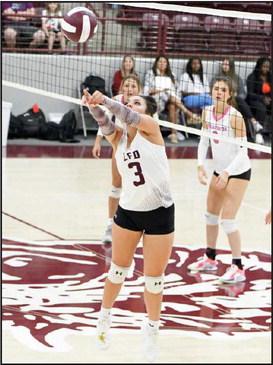 Littlefield’s Bri Valdez digs a ball to keep it in play, as the Lady Cats look to go on the attack, during the first set of the Lady Cats’ district match-up with Shallowater on Tuesday at Wildcat Gym. (Staff Photo by Derek Lopez)
