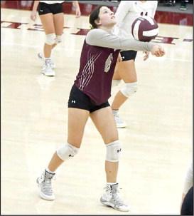GOING ON THE ATTACK - Littlefield Libero, Madi Brown, bumps the ball up in the air, looking to get it into position for her team to go on the attack, during the Lady Cats final pre-district match against Post on Tuesday at Wildcat Gymnasium. (Staff Photo by Derek Lopez)