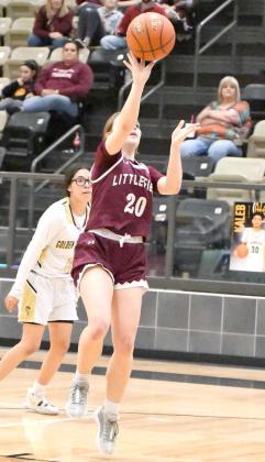 Littlefield senior, Kennadi Hanlin (20), puts up a floater from the left elbow, during the second half of the Lady Cats’ victory over Lamesa on Tuesday on the road. (Staff Photo by Derek Lopez)