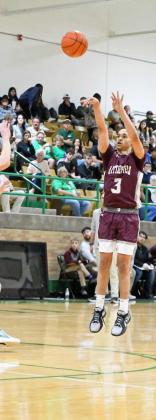 Littlefield’s Ryan Williams knocks down an open three from the top of the key, during the first half of the Wildcats’ road victory over Idalou on Friday. (Staff Photo by Derek Lopez)