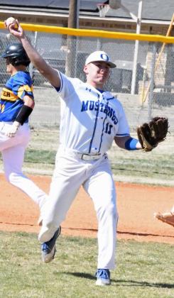 Olton junior, Alan Vasquez, fields up a ball at third base and throws it to first for an out, during the Mustangs district-opening win over the Hale Center Owls on Monday, 10-8. (Staff Photo by Derek Lopez)