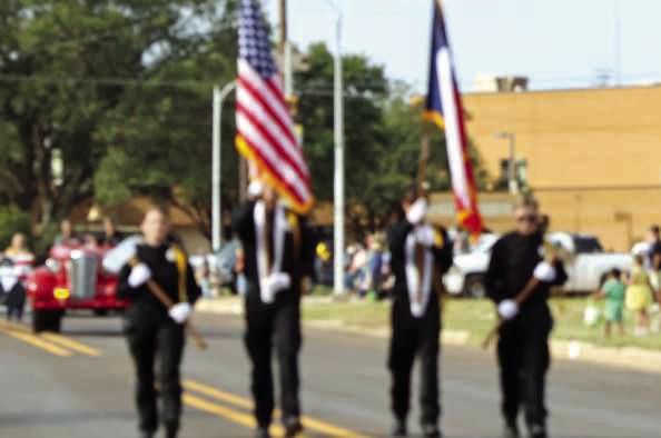 The Sudan Harvest Parade kicked off with the Sudan Fire Department Honor Guard and an antique fire engine on Saturday, Sept. 27, 2025. (Photo by Ann Reagan)