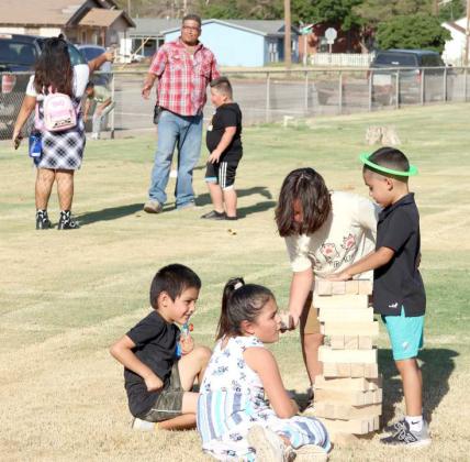 The playground equipment was busy during the Littlefield Primary Back to School family hot dog picnic on Monday August 26, 2024 at the Littlefield Primary School Playground. (Photo by Ann Reagan)
