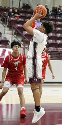 Littlefield’s Chase Coronado goes up for a lay-up, during the first half of the Wildcats’ home loss to Denver City on Saturday. (Staff Photo by Derek Lopez)