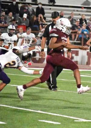 BREAKING LOOSE – Littlefield junior tailback, Ty’Jae Chambers, breaks through the defense on his way to a 69-yard touchdown run to put the Wildcats back out in front, 15-9, over River Road in the fourth quarter of Friday’s district-opener. (Staff Photo by Derek Lopez)