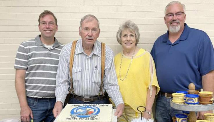 39 YEARS OF SERVICE to the Lamb County Electric Cooperative employees and members. After the August monthly board meeting, Charles Ramage was honored with lunch, cake, and ice cream. In appreciation for his commitment and years of service as a Director on the Lamb County EC Board. Charles was first elected to serve in September 1982. Charles was accompanied by his son Bobby, his wife Fran, and his son Michael. (Photos courtesy of LCED)