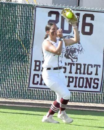 Littlefield junior left fielder, Alyssa Torres, catches a fly ball in leftcenter field, during the Lady Cats’, 5-4, victory over the Muleshoe Lady Mules on Tuesday to close out the regular season. (Staff Photo by Derek Lopez)