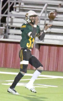 TOUCHDOWN WOLVERINES - Springlake-Earth’s Cain Tovar, catches a 40-yard touchdown pass from senior, Jerry Gallegos to put the Wolverine’s up, 42-34, with 2:08 to play in the third quarter, during the Wolverines’ Bi-district Championship victory over Spur in Lockney on Thursday night. (Staff Photo by Derek Lopez)