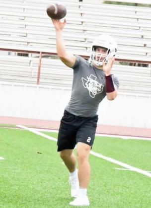 ON TARGET – Littlefield’s Mason Jones delivers a pass during route running drills, during the Wildcats’ first day of two-a-days on Monday. (Staff Photo by Derek Lopez)