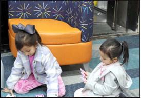 Lexi Cristan, age 7 and Brailee Cristan, age 6, were busy solving a puzzle during the Lamb County Library Pajama Party held on Thursday January 30, 2025. (Photo by Ann Reagan)