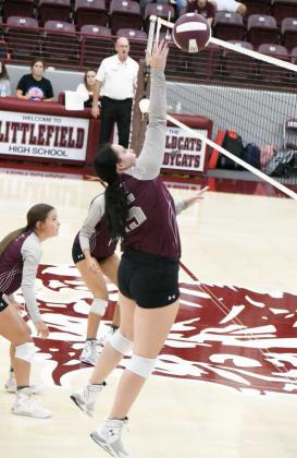 LOOKING FOR A KILL – Littlefield’s Kyndal Edgemon leaps up to strike the ball, looking to score a kill, during the Lady Cat’s first set with the Estacado Lady Matadors on Tuesday at Wildcat Gym in Littlefield. (Staff Photo by Derek Lopez)
