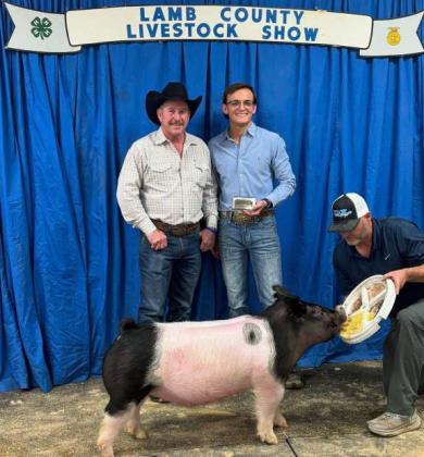 ZAYNE HUMPHREYS of Sudan Grand Champion Swine