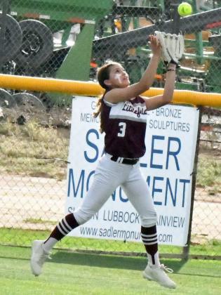 Littlefield’s Cali Saldana, catches a fly ball for an out in center field, during the Lady Cats’, 4-2, loss to the Slaton Tigerettes on Thursday in their regular season finale in Slaton. (Staff Photo by Derek Lopez)