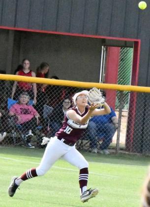 Littlefield’s Myli Hernandez, runs up and gets under a fly ball in shallow right field, during the Lady Cats’, 4-2, loss to the Slaton Tigerettes on Thursday in their regular season finale in Slaton. (Staff Photo by Derek Lopez)