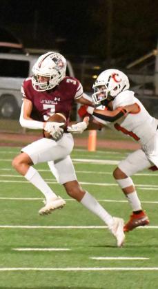 CHUNK PLAYS - Littlefield receiver, Omar Martinez (3), makes a huge catch over the middle to give the Wildcats a first down in Cubs territory, during the second half of the Wildcats’, 28-14, loss to the Cubs on Friday to close out the pre-district schedule. (Staff Photo by Derek Lopez)