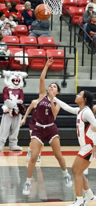 Littlefield guard, Jazmine Rosalez (5) gets into the paint for a lay-up, during the second half of the Lady Cats’, 76-32, road victory over the Brownfield Lady Cubs on Tuesday in district play. (Staff Photo by Derek Lopez)
