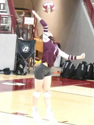 SENDING THE SERVE – Littlefield junior, Brynna Ray, sends a serve over the net, during the Lady Cats’ loss to the Brownfield Lady Cubs on Saturday in their first meeting of District Play. (Staff Photo by Derek Lopez)