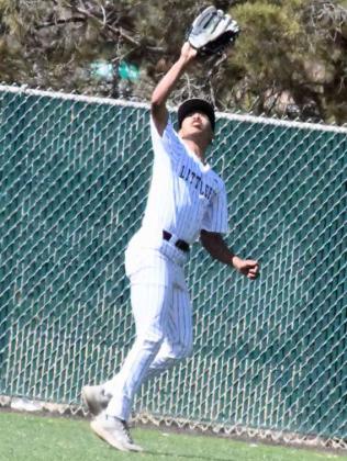 OUT IN THE AIR - Littlefield right fielder, Markus Rosales, catches a fly ball in right field to record an out for the Wildcats, during their, 10-0, home loss to Denver City in their first meeting of District play. (Staff Photo by Derek Lopez)