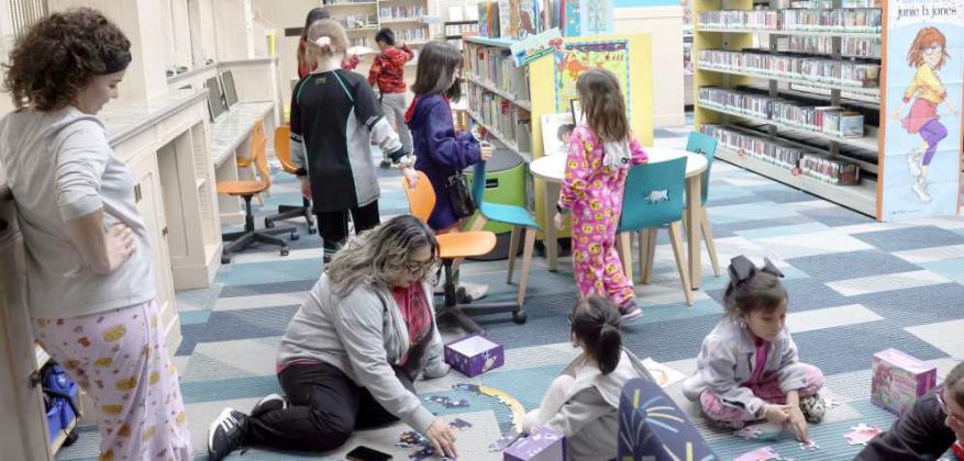 Parents and children of all ages enjoyed activities including a showing of the movie “Frozen II”, reading, playing games, eating pancakes and solving puzzles at the Lamb County Library Pajama party held Thursday January 30, 2025. (Photo by Ann Reagan)