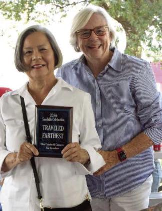Esther Houser received the award for furthest traveled at the Recognition of Pioneers and Guests program during the 2026 Olton Sandhills Celebration on Aug. 1. (Photo by Leon Szaniszlo)